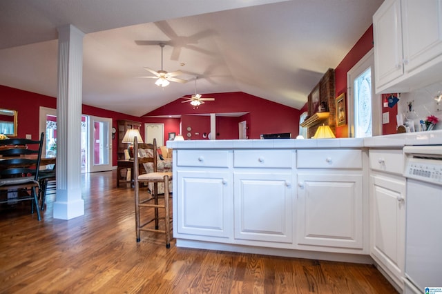 kitchen with ceiling fan, lofted ceiling, hardwood / wood-style flooring, and white cabinetry