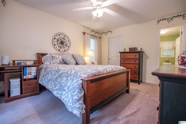 bedroom featuring ceiling fan and carpet floors