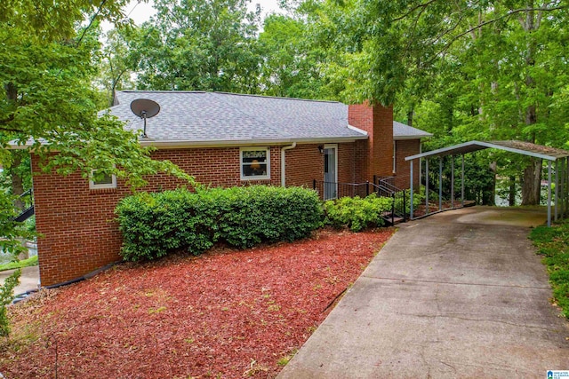 view of front of property with a carport