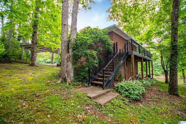 view of yard with a wooden deck