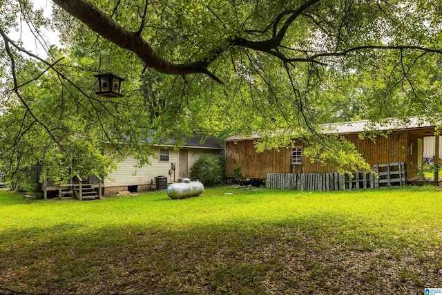 view of yard featuring central AC