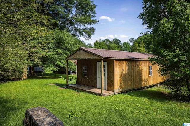 view of outdoor structure with a yard