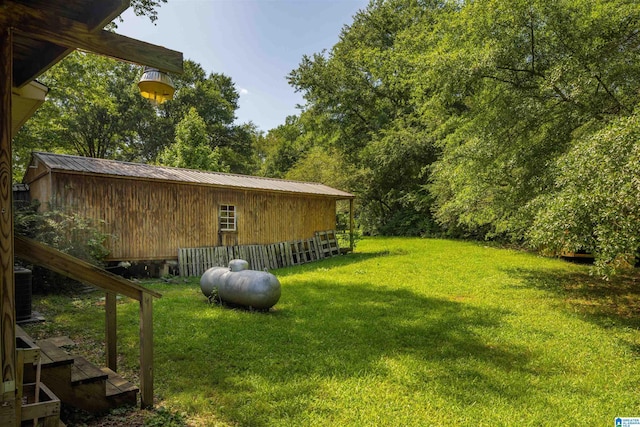 view of yard featuring central AC