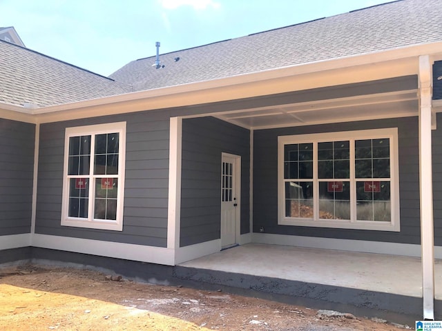 property entrance with a patio