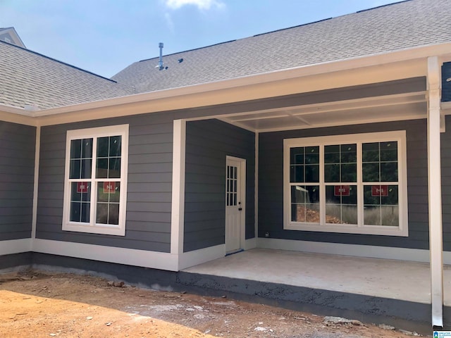 entrance to property with a patio area