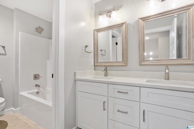 full bathroom featuring toilet, vanity, and shower / bath combination