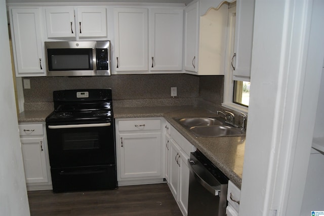 kitchen with white cabinetry, sink, and appliances with stainless steel finishes