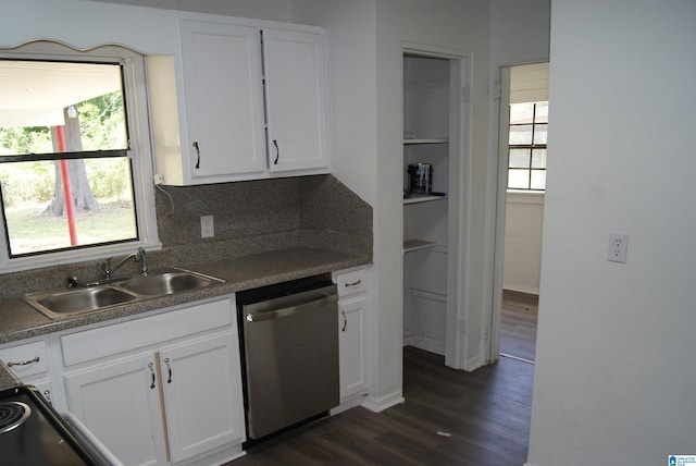 kitchen featuring stainless steel dishwasher, dark hardwood / wood-style flooring, white cabinets, and sink