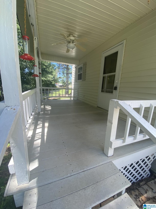 view of patio featuring covered porch and ceiling fan