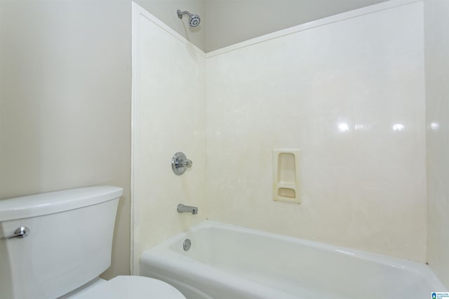 bathroom with shower / bathtub combination and toilet