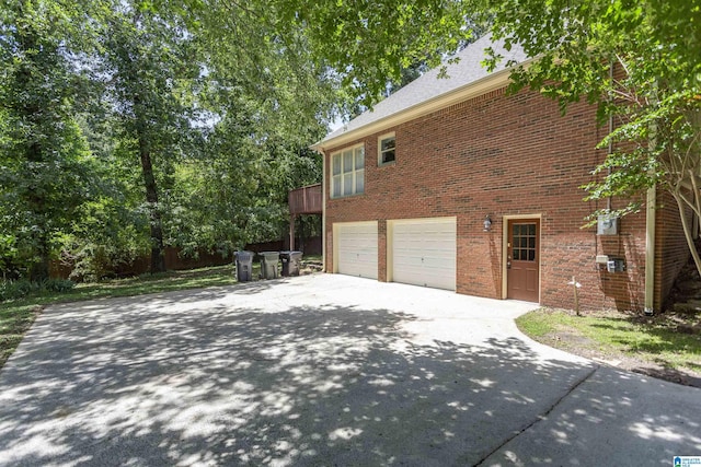 view of property exterior featuring a garage