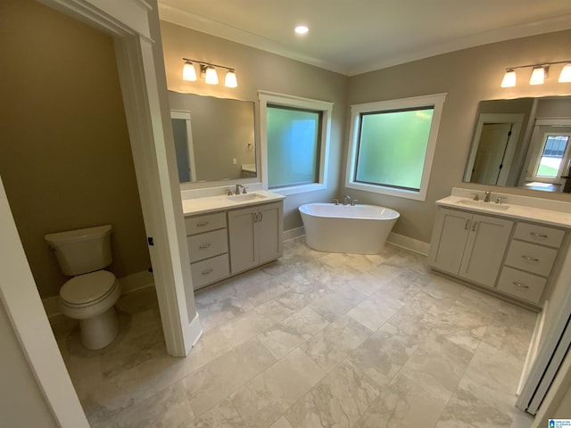 bathroom featuring vanity, a bath, toilet, and crown molding