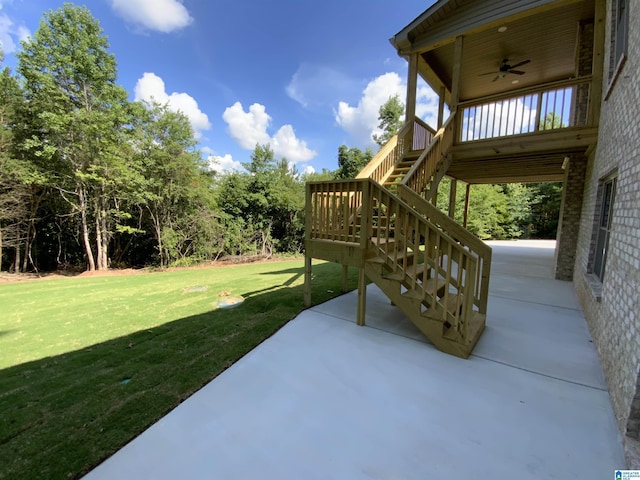 view of patio / terrace with ceiling fan and a wooden deck