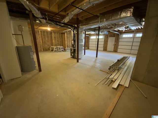 basement with heating unit and water heater