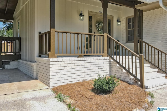 doorway to property featuring a porch