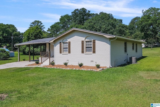 exterior space with a lawn, central AC unit, and a carport