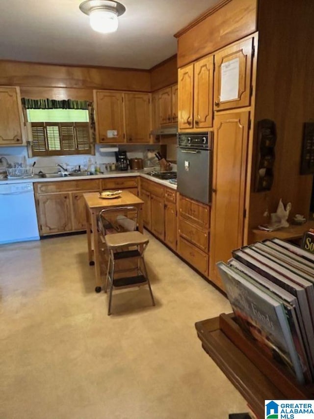 kitchen with dishwasher, gas stovetop, black oven, and sink