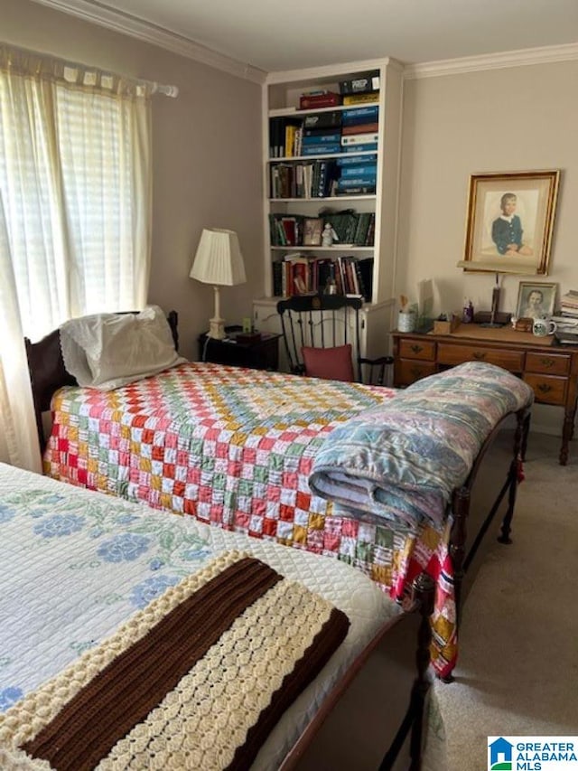 bedroom featuring carpet flooring and crown molding