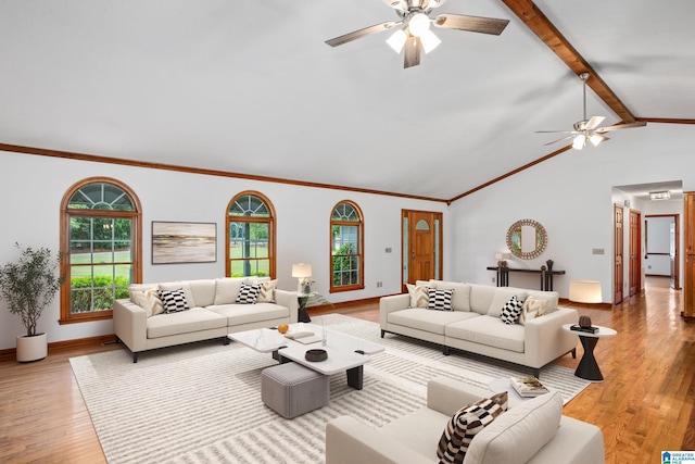 873 Buckelew Rd, Anniston, AL 36207 - living room featuring ceiling fan, healthy amount of natural light, light wood-style flooring, crown molding, and baseboards