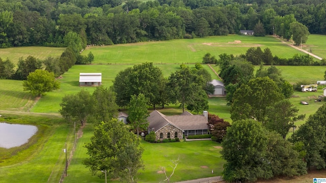 birds eye view of property with a water view and a rural view