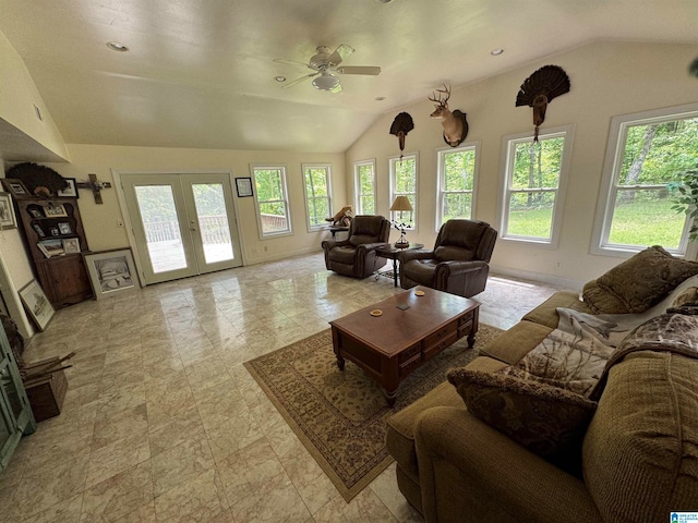 living room with vaulted ceiling, ceiling fan, and french doors