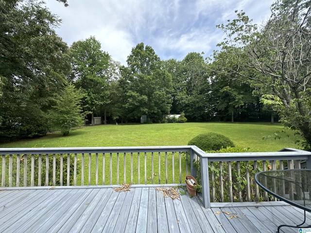 wooden deck with a yard