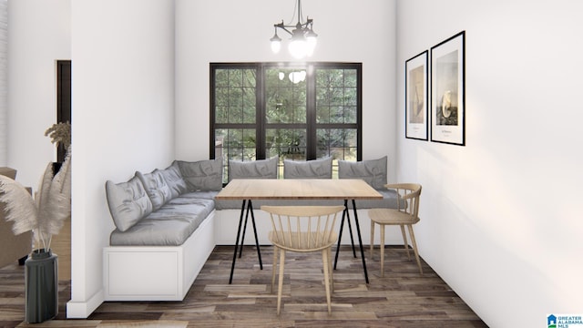 dining space featuring a notable chandelier, breakfast area, and dark wood-type flooring