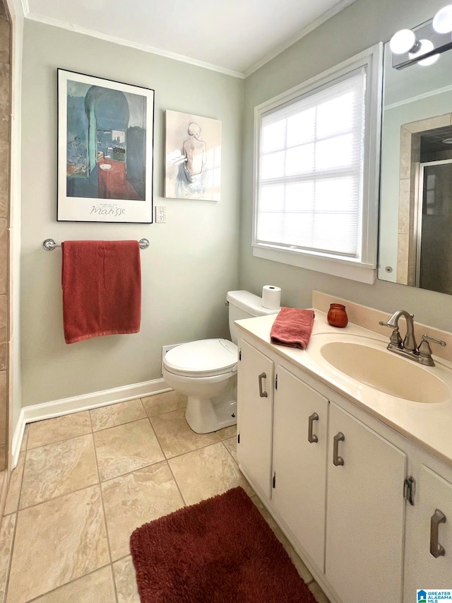 bathroom featuring vanity, toilet, ornamental molding, and walk in shower