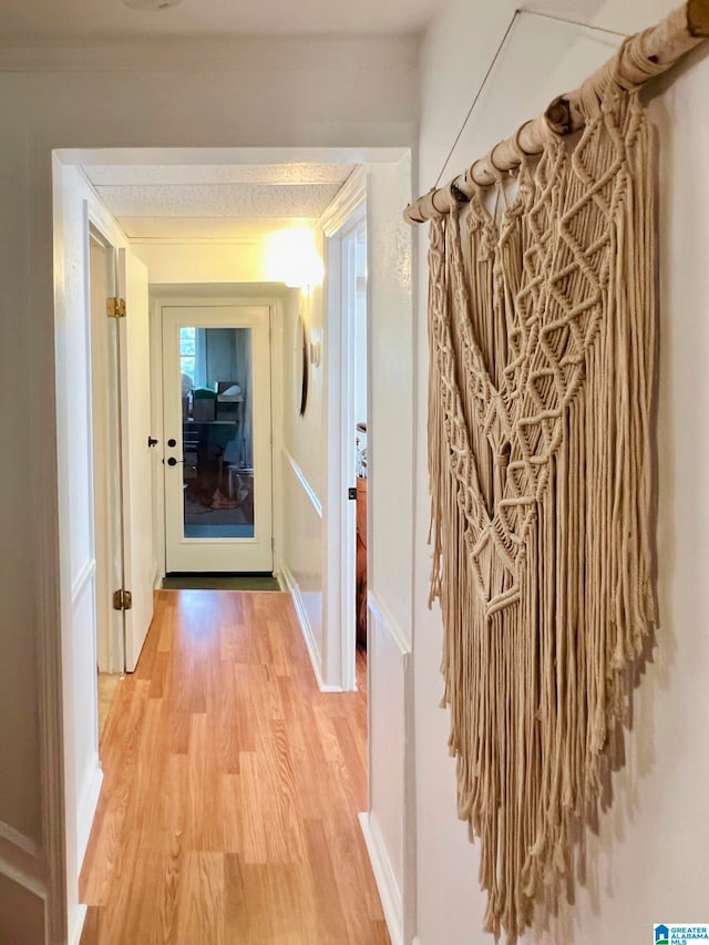 hallway featuring hardwood / wood-style flooring