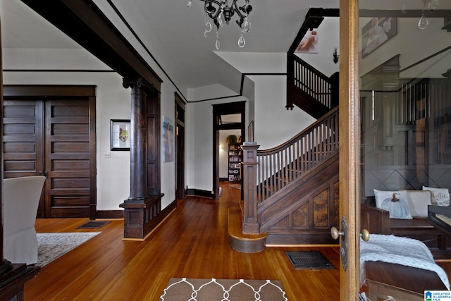 stairs with hardwood / wood-style floors