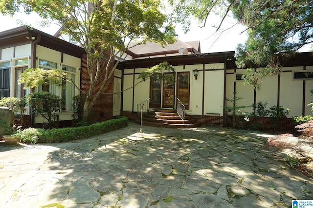 rear view of house with a patio area