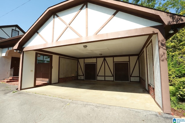 exterior space featuring a carport