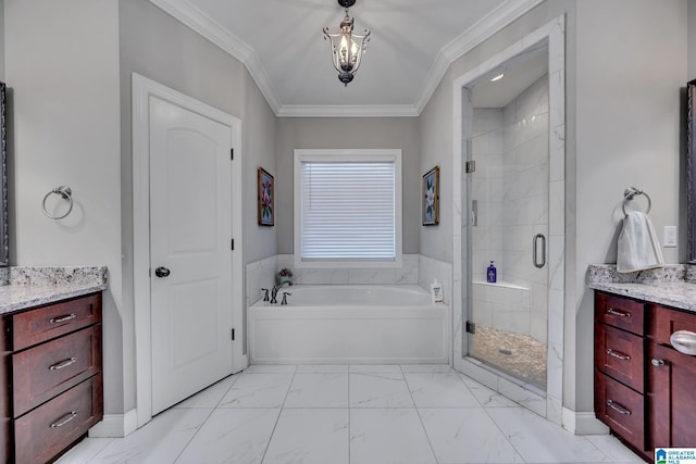 bathroom featuring vanity, ornamental molding, and shower with separate bathtub