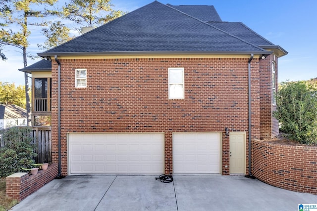 view of property exterior with a garage