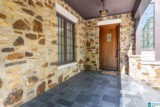 hallway featuring dark hardwood / wood-style flooring and ornamental molding