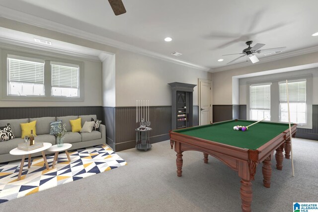 living room with crown molding and hardwood / wood-style floors