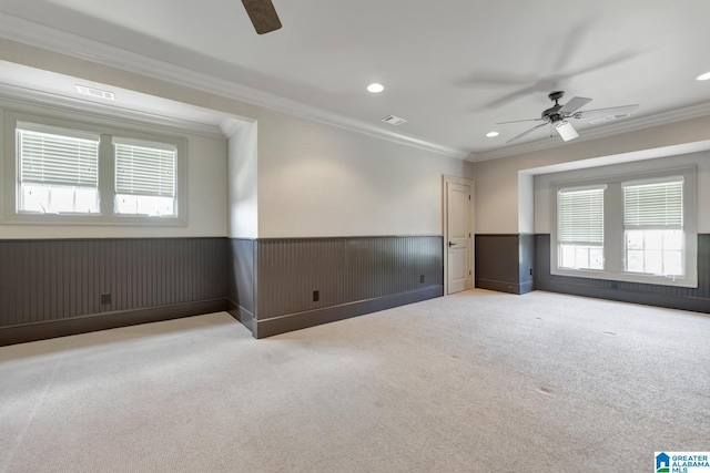 home theater room with ornamental molding