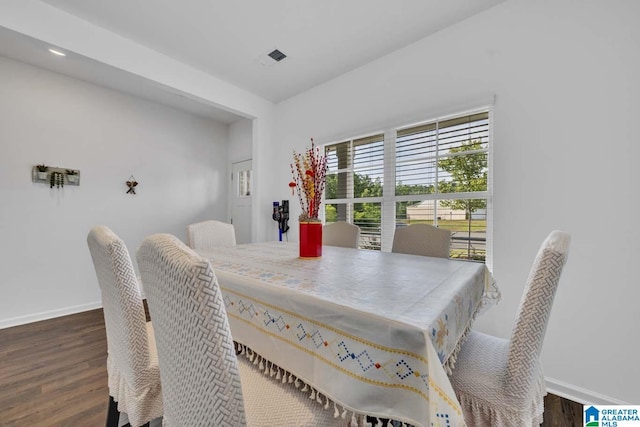 dining room featuring dark hardwood / wood-style flooring