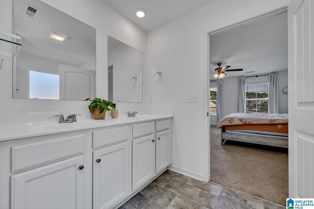 bathroom with ceiling fan and vanity