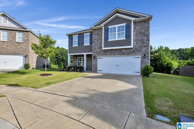 view of front of property with a front yard and a garage