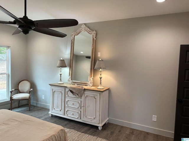 bedroom featuring dark hardwood / wood-style flooring