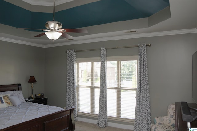 bedroom with multiple windows, ceiling fan, and crown molding