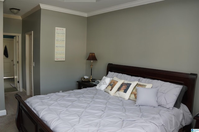 carpeted bedroom with crown molding