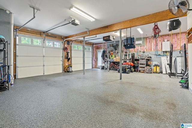 garage featuring a workshop area and a garage door opener