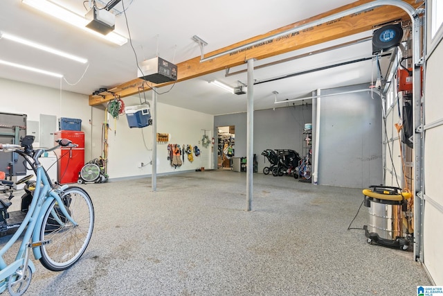 garage featuring a garage door opener