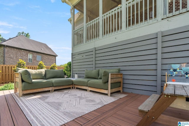 wooden deck featuring an outdoor hangout area