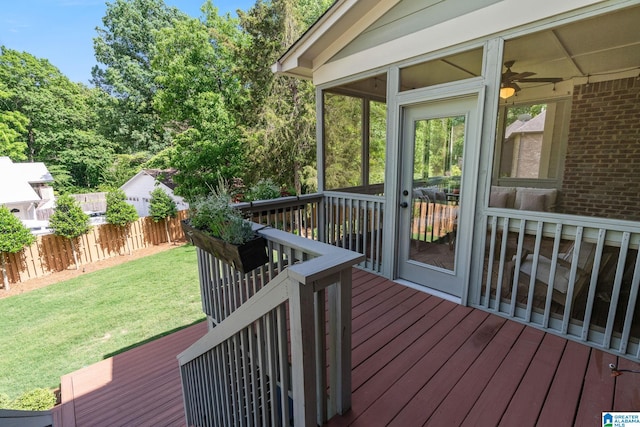 wooden deck with a yard