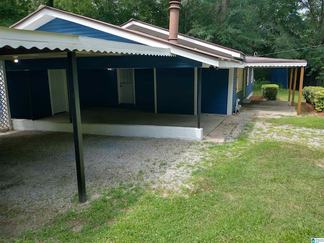 view of side of home with a patio