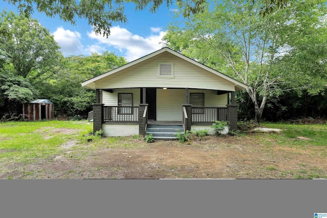 bungalow featuring a porch