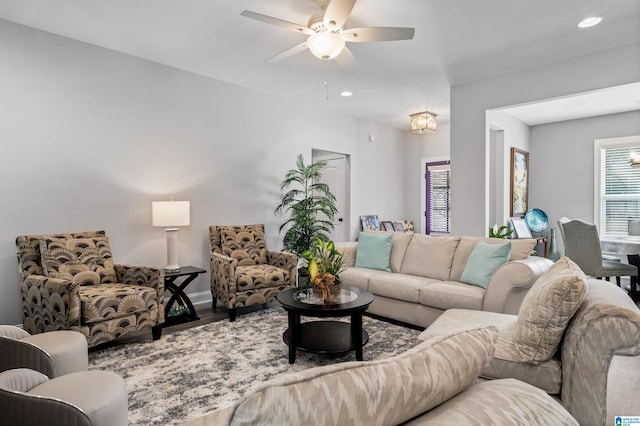 living room with ceiling fan, a healthy amount of sunlight, and hardwood / wood-style floors